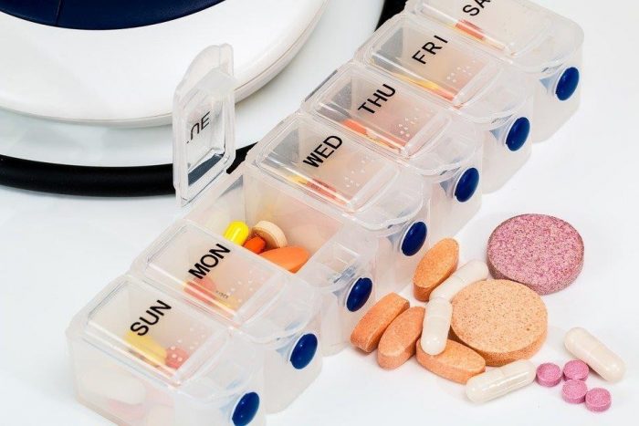 A pill box with different medications