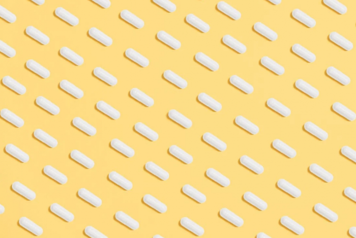 Pills with a yellow background